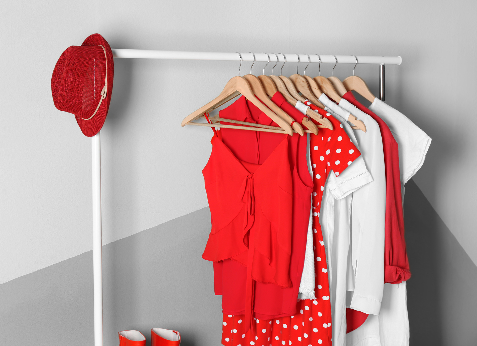 Collection of Clothes Hanging on Rack in Dressing Room